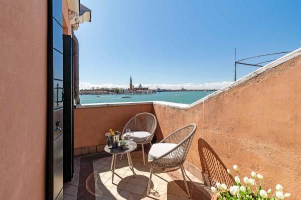 A la foto es mostra l'objecte San Giorgio View Apartment with Terrace R&R situat a la ciutat de Venècia.