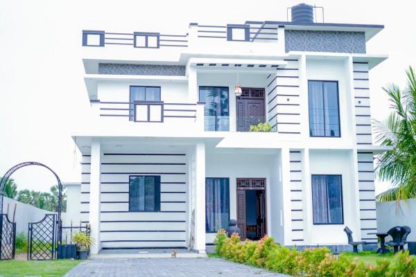 照片显示了位于Batticaloa市的New Sunny Side Residence物件。