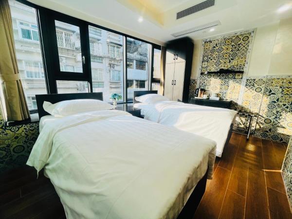 A la foto es mostra l'objecte Hou Kong Boutique Hostel situat a la ciutat de Macau.