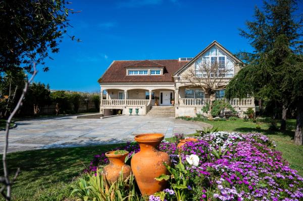 På billedet ses objektet Green Garden House beliggende i byen Caleiro.