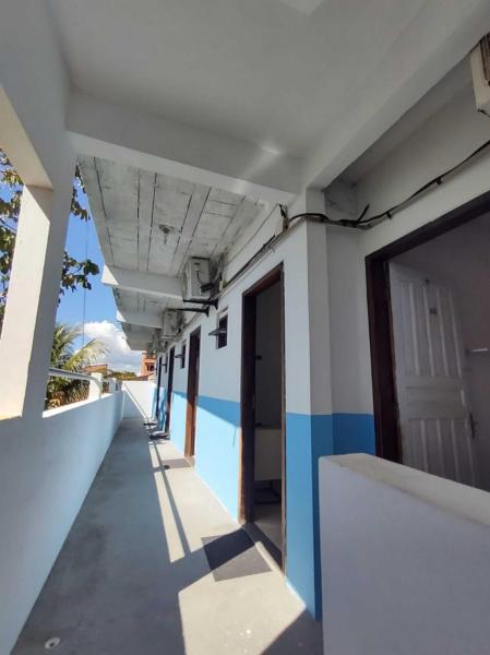 写真にはCabuçu市にあるQuarto 1 triplo café da manhã em Pousada, Praia de Cabuçu BAが写っています。