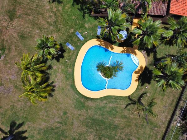 På billedet ses objektet Villa Vitali - Casa vacacional con Piscina y Jardines en Morrocoy para 14 personas beliggende i byen Buena Vista.