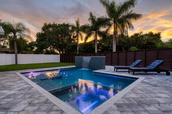 The photo shows the Modern 3 BR luxury pool home on Lido Key - A Shore Thing located in the city of Bailey Hall.