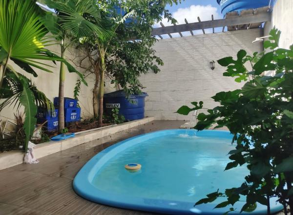 写真にはSeabra市にあるCasa com piscina e ar condicionadoが写っています。