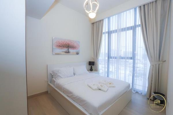 På billedet ses objektet Luxury 2-BHK Apartment Located in Azizi riviera 47 Riv 47-419 beliggende i byen Dubai.