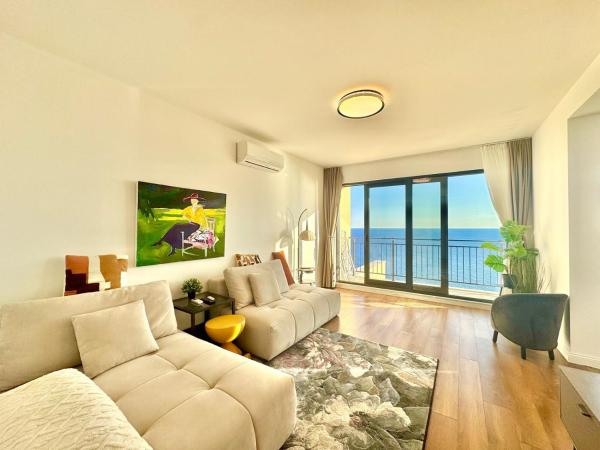 The photo shows the Apartments Azimut Rezevici located in the city of Krstac.