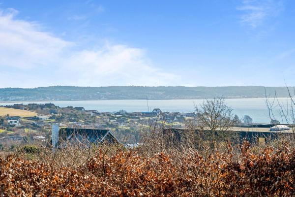 A la foto es mostra l'objecte Cozy House By Handrup With A Sea View Over Ebeltoft Vig situat a la ciutat de Ebeltoft.