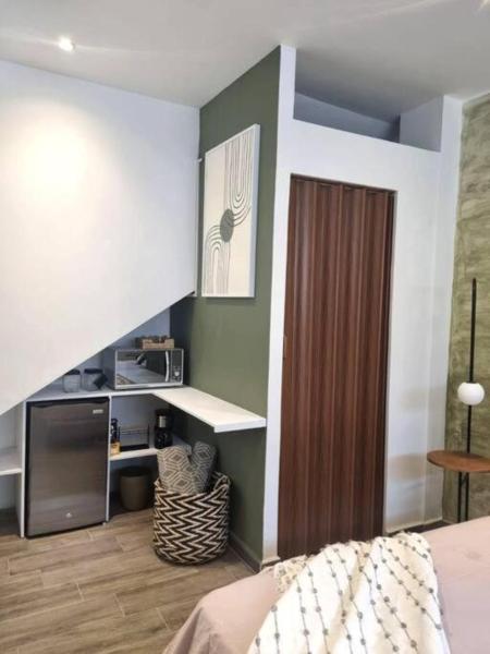 Foto 2: 0 - Suite de Lujo Confort Cama Queen Size Roma Sur