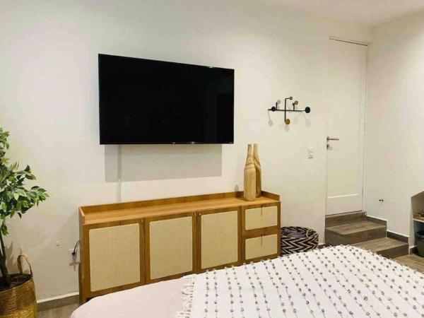 Foto 6: 0 - Suite de Lujo Confort Cama Queen Size Roma Sur