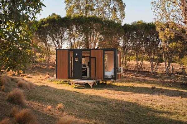 The photo shows the Rowsley Valley Tiny House 1 by Tiny Away located in the city of Ballan.