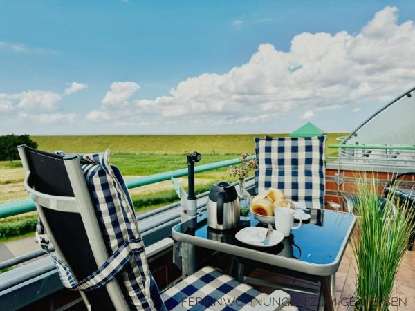 A la foto es mostra l'objecte Nordseepanorama in der Ferienwohnung de Spant situat a la ciutat de Dorum Neufeld.