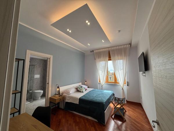 Auf dem Foto ist das Objekt Caridei Rooms in der Stadt Neapel zu sehen.