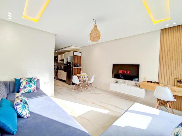 A la foto es mostra l'objecte Luxury Condo Mehdia Beach, Parking, Netflix, Games, High Speed Internet situat a la ciutat de Kenitra.