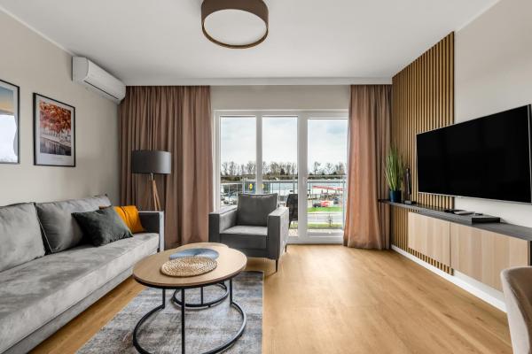 Στη φωτογραφία φαίνεται το αντικείμενο Elegant Beige Harmony Apartment by BookingHost που βρίσκεται στην πόλη Mańki.