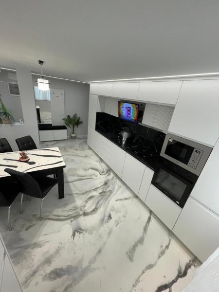 Na zdjęciu widoczny jest obiekt Apartament Centru Comanesti położony w mieście Asău.