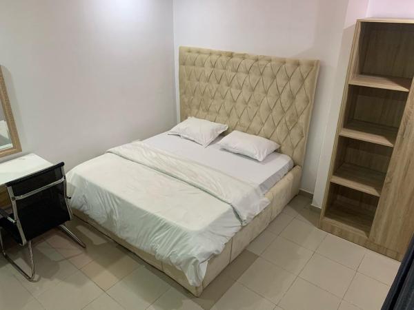 A la foto es mostra l'objecte House 26 Apartment and Suites situat a la ciutat de Ikeja.