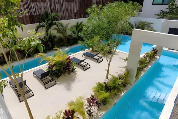 Na zdjęciu widoczny jest obiekt Departamento con alberca privada en Tulum położony w mieście Tulum.