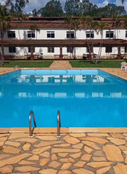 Na fotografii je vidět objekt Pousada e piscina ESTORIL nacházející se ve městě Soledade de Minas.