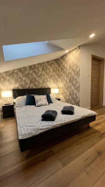 På bildet vises objektet NEW Apartament BLACK Warszawa Parking FREE som ligger i byen Wola Mrokowska.