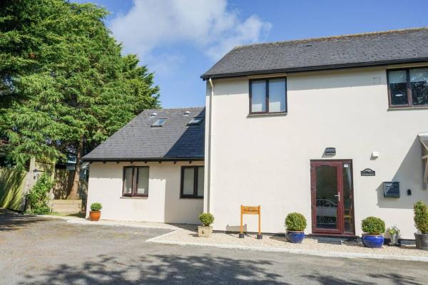 Na fotografii je vidět objekt Peaceful Annexe With Patio Near Coast & Exmoor nacházející se ve městě Fremington.