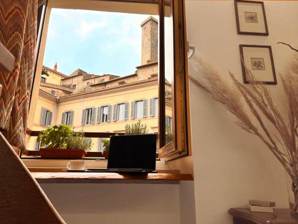 A la foto es mostra l'objecte Cozy House in San Rocco situat a la ciutat de Bolsena.