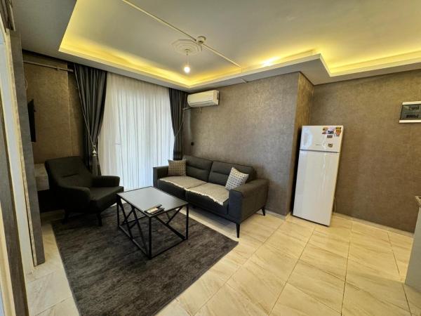 A la foto es mostra l'objecte Aslan Suit Otel situat a la ciutat de Buca.