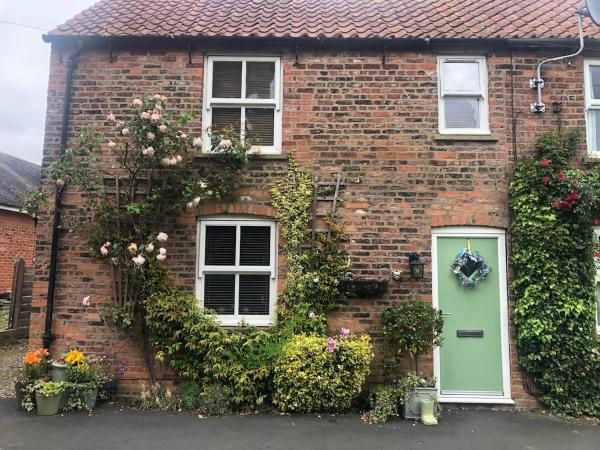 A la foto es mostra l'objecte Quaint Country Cottage situat a la ciutat de Welwick.