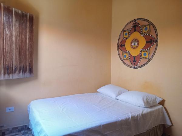 A la foto es mostra l'objecte Quarto para 4 com banheiro privado a 900 metros da Vila do Capão situat a la ciutat de Vale do Capao.
