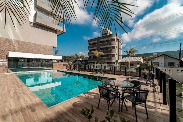 A la foto es mostra l'objecte Terrazzo 408A - Apartamento 02 quartos - Acomoda até 05 pessoas - À poucos metros da praia de Bombas - (Consultar serviços de roupa de cama e banho) situat a la ciutat de Bombas.