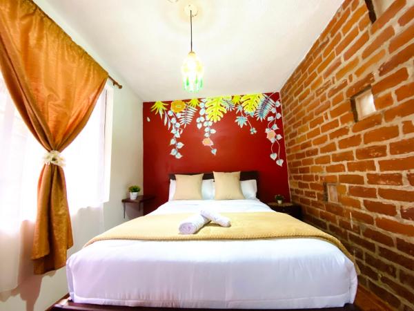 A la foto es mostra l'objecte Hostal Green Garden situat a la ciutat de Baños.