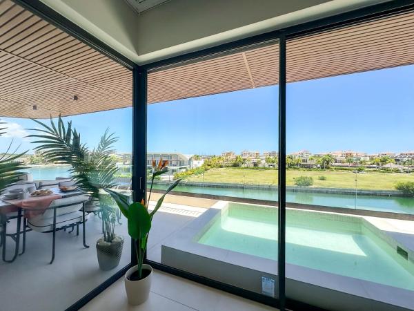 A la foto es mostra l'objecte Marina Garden Cap Cana by Beach Homes Punta Cana situat a la ciutat de Punta Cana.
