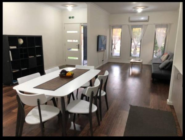 The photo shows the Serenity Home 11 by Hiverooms located in the city of Pakenham.