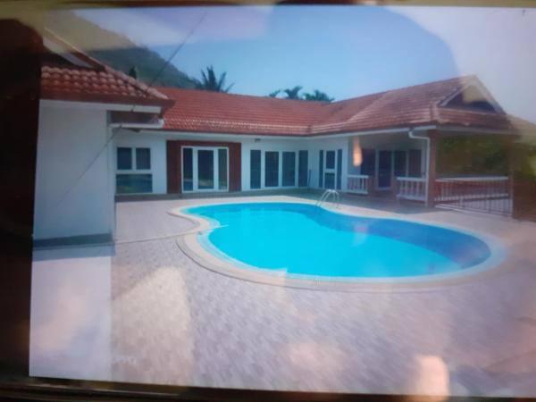 A la foto es mostra l'objecte Pool View 5 Room situat a la ciutat de Rawai Beach.