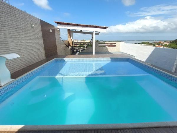 Na fotografii je vidět objekt Grande Casa com Piscina - São Pedro da Aldeia,Cabo Frio,Arraial nacházející se ve městě Fonseca.