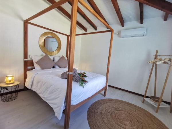 A la foto es mostra l'objecte Villa Bleu Soley situat a la ciutat de LʼAnse Mitan.