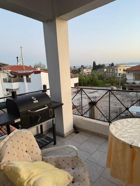A la foto es mostra l'objecte Tsoumaris House situat a la ciutat de Rovies.