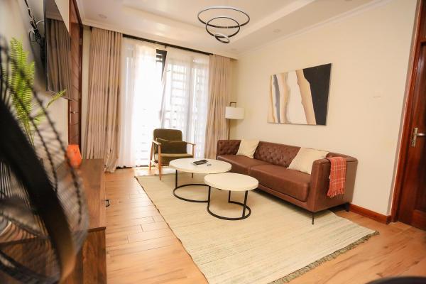 The photo shows the Yunia Luxury 1-Bed Apartment located in the city of Busia.