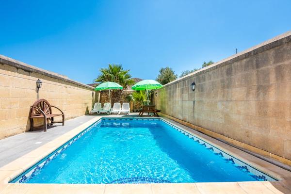 A la foto es mostra l'objecte 4 Bedroom Holiday Home with Private Pool situat a la ciutat de Għarb.