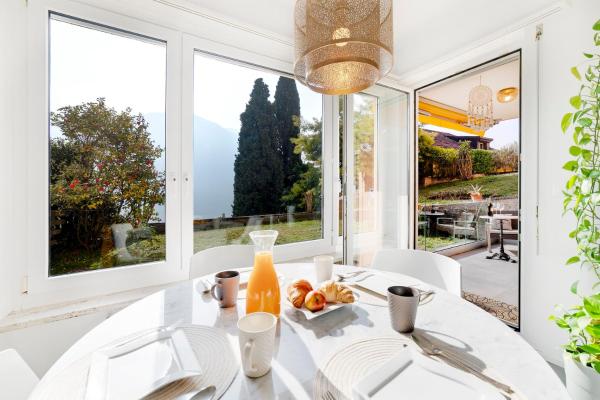 A la foto es mostra l'objecte Relax with Lake View & Private Parking situat a la ciutat de Lugano.