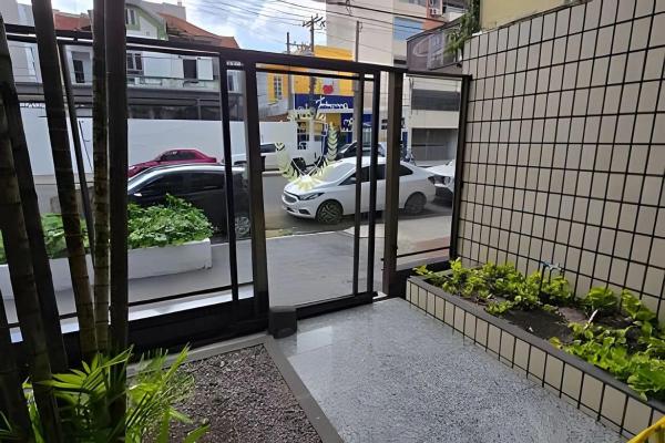 The photo shows the Ed. Delta Gardenn located in the city of Carmo.