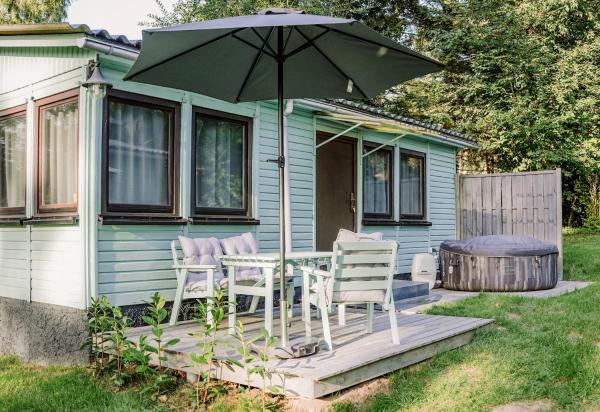 Ferienhäuser Insel Usedom Waldhaus 2 mit Whirlpool - Direkt am Achterwasser, Lütow