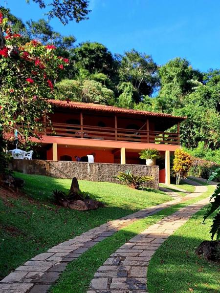 A la foto es mostra l'objecte casa de campo bem na natureza situat a la ciutat de Coqueiros.