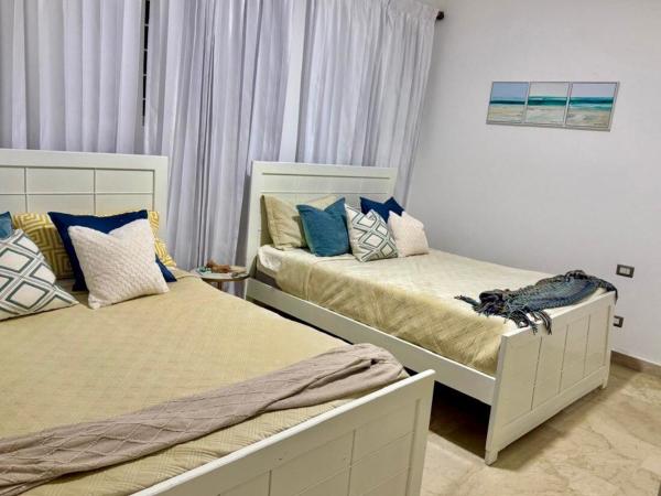 Op de foto is het object Cozy Apartment with Private Pool in Punta Cana te zien, gelegen in de stad Básima.