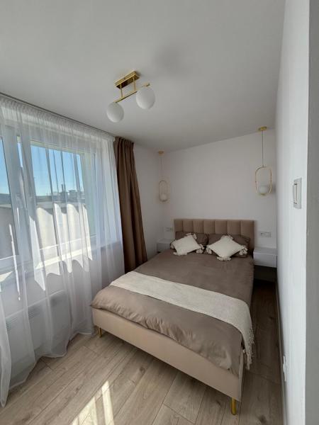 Na fotografii je vidět objekt Apartament Gold Rynek Mieroszów Wi-Fi, nc plus nacházející se ve městě Łączna.