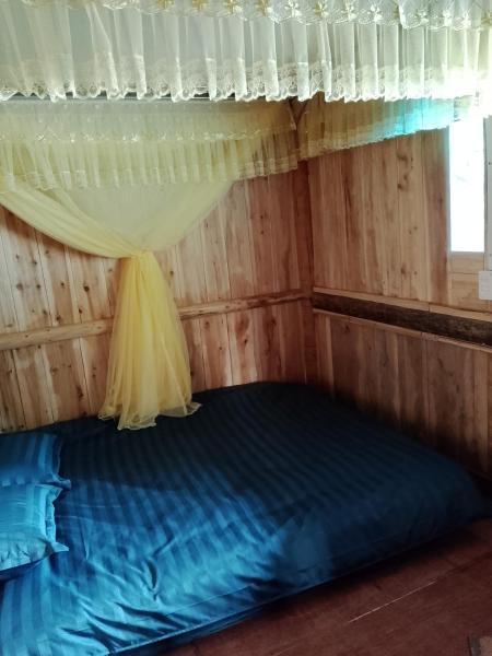 På billedet ses objektet Nhà Gỗ Cổ homestay Lao xa beliggende i byen Dồng Văn.