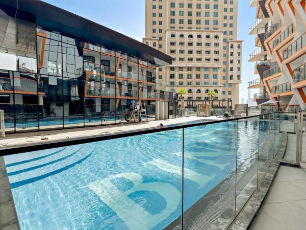 A la foto es mostra l'objecte Central Dubai 1BR with Pool, Gym, WiFi, and Full Kitchen Access situat a la ciutat de Dubai.