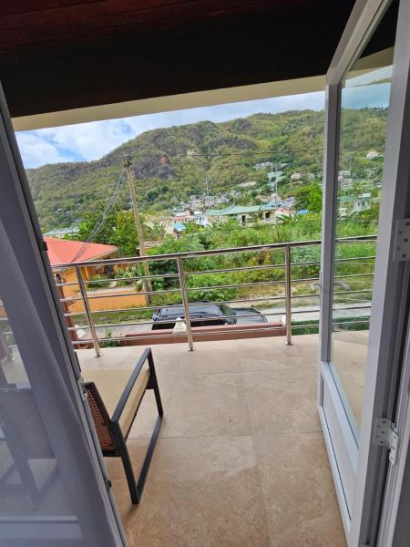 A la foto es mostra l'objecte Agape Suites-Room 3- 1st Floor situat a la ciutat de Soufrière.
