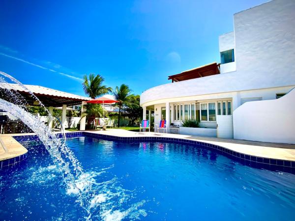 Auf dem Foto ist das Objekt Casa Grega Aju em Condomínio Frente Mar com Piscina in der Stadt Aracaju zu sehen.