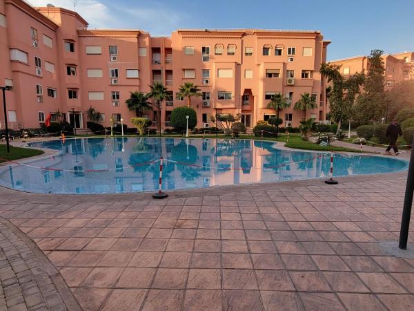 Na fotografii je vidět objekt Résidence Majorelle 2 - Appartement Spacieux 2 Chambres & Piscine nacházející se ve městě Marakéš.