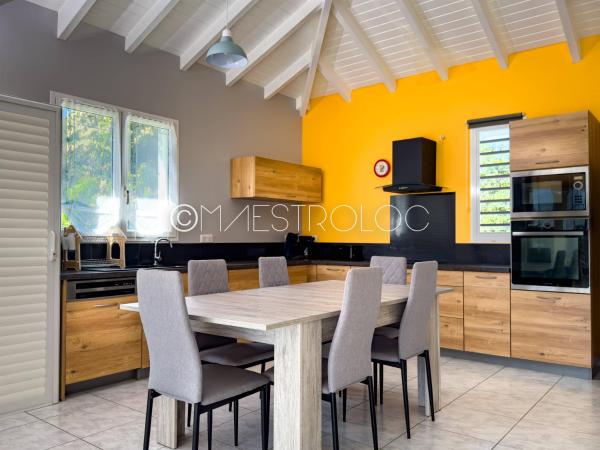 На фото показан объект Villa Perrin Évasion à la campagne 1CH à 9 min de l'aéroport de la Guadeloupe, расположенный в городе Belle-Plaine.